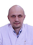 Врач Каравай Роман Сергеевич